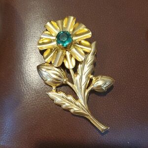 Gold Flower Brooch with Teal Rhinestone Center